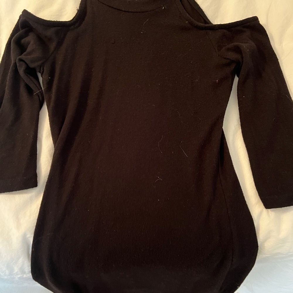 Black dress stretch material cut out shoulders.
